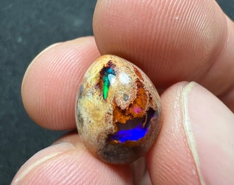 Amazing fire opal on matrix with its beautiful sparkles and landscapes AAA quality weight 7.20 carats measure 15x11x7mm