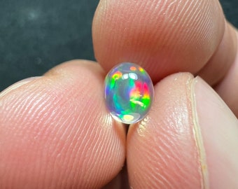 Amazing water opal with its beautiful sparkles and rutile inlays AAA quality weight 0.95 carats measure 7x6x4mm