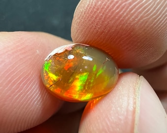 Amazing fire opal with its beautiful sparkles and quarry inlay AAA quality weight 2.90 carats measure 11x8x5.5mm
