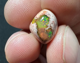 Amazing fire opal on matrix with its beautiful sparkles AAA quality weight 5.50 carats measure 14.5x11.5x6 mm