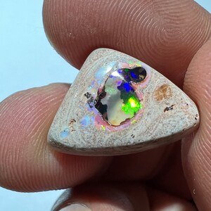 Amazing fire opal on matrix with its beautiful sparkles and landscapes AAA quality weight 10.75 carats measure 21x15x6 mm image 4