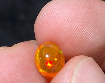 amazing fire opal with its beautiful rainbow sparkles  AA quality weight 1.45 carats measure 8x7x4.5mm