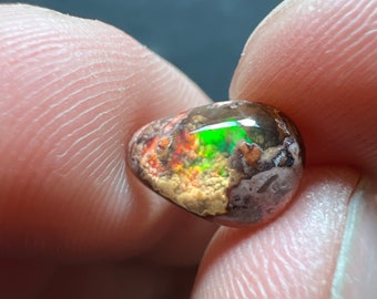 Amazing fire opal on matrix with its beautiful sparkles and landscapes AAA quality weight 2.15 carats measure 11x8x4mm