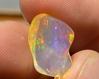 amazing water opal with its beautiful rainbow sparkles  weight 8.85 carats measure 16x10x10mm