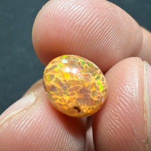 Amazing fire opal on matrix with its beautiful sparkles and landscapes AAA quality weight 3.45 carats measure 17x13x9 mm image 6