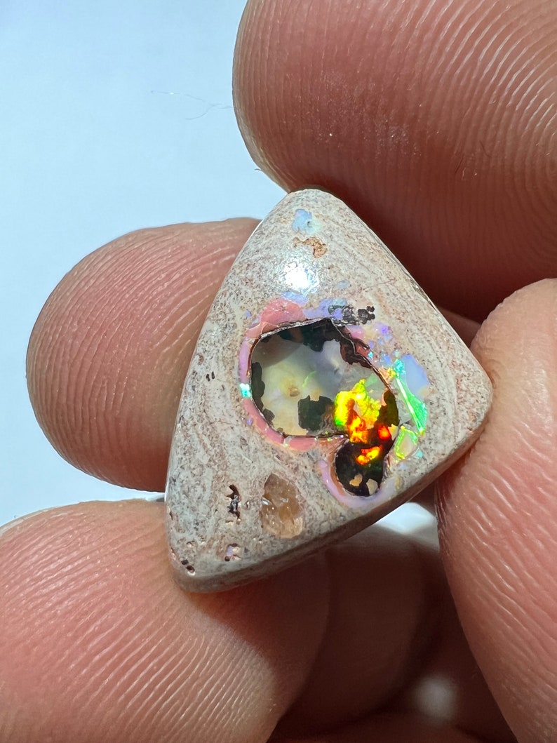 Amazing fire opal on matrix with its beautiful sparkles and landscapes AAA quality weight 10.75 carats measure 21x15x6 mm image 7