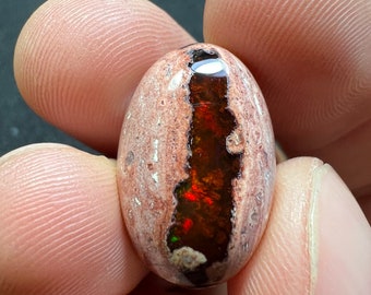 Amazing fire opal on matrix with its beautiful sparkles and landscapes AAA quality weight 18.70 carats measure 22.5x15x8mm