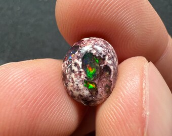 Amazing fire opal on matrix with its beautiful sparkles and landscapes AAA quality weight 4.50 carats measure 13x10x5 mm