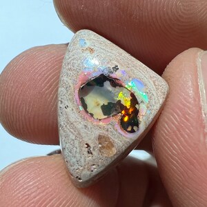 Amazing fire opal on matrix with its beautiful sparkles and landscapes AAA quality weight 10.75 carats measure 21x15x6 mm image 6