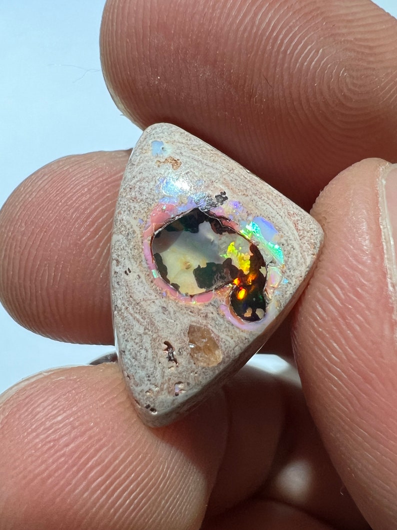 Amazing fire opal on matrix with its beautiful sparkles and landscapes AAA quality weight 10.75 carats measure 21x15x6 mm image 6