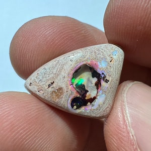 Amazing fire opal on matrix with its beautiful sparkles and landscapes AAA quality weight 10.75 carats measure 21x15x6 mm image 9