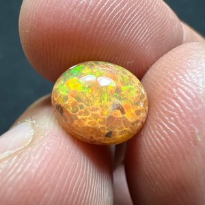 Amazing fire opal on matrix with its beautiful sparkles and landscapes AAA quality weight 3.45 carats measure 17x13x9 mm image 9