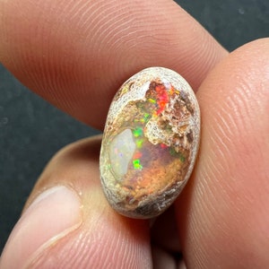 Amazing fire opal on matrix with its beautiful sparkles AAA quality weight 7.40 carats measure 16x10x7 mm image 5