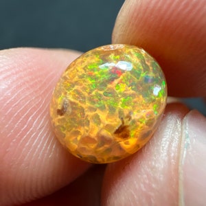 Amazing fire opal on matrix with its beautiful sparkles and landscapes AAA quality weight 3.45 carats measure 17x13x9 mm image 3