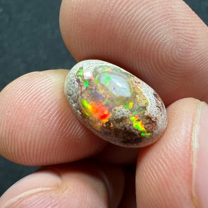 Amazing fire opal on matrix with its beautiful sparkles AAA quality weight 7.40 carats measure 16x10x7 mm image 1