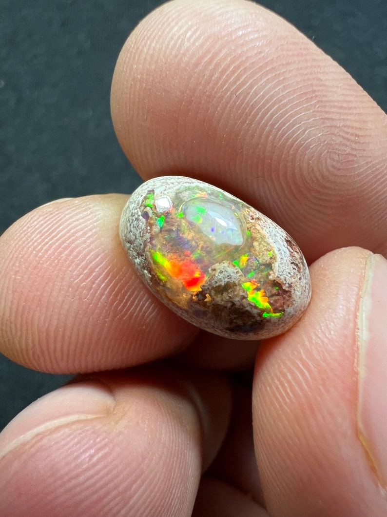 Amazing fire opal on matrix with its beautiful sparkles AAA quality weight 7.40 carats measure 16x10x7 mm image 1