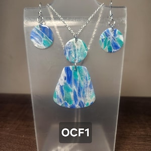 Handmade ocean inspired and flower polymer clay earring and necklace set sea sunflower