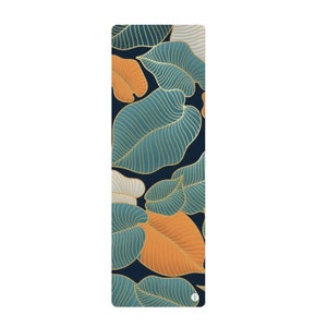 May include: A yoga mat with a blue, green, and orange leaf pattern. The leaves have gold outlines and are on a dark blue background.