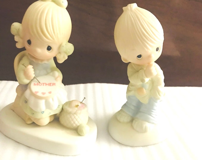 Precious Moments Figurines: 1979 Mother Sew Dear, 1977 SmileGod Loves You Figurine