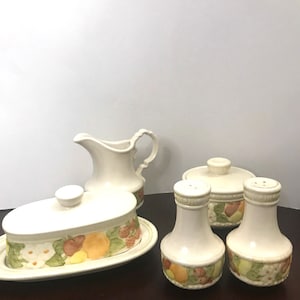 Metlox Della Robbia-Poppytrail/ Gravy Boat/Soup Bowls/ Butter Dish/ Cream and Sugar/ Salt and Pepper/ Platters/ Chop Plate