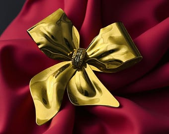 Grande broche vintage en ruban avec nœud et ornements dorés