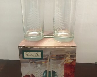 Juego de cuatro vasos altos navideños Holiday Gold de Indiana Glass.