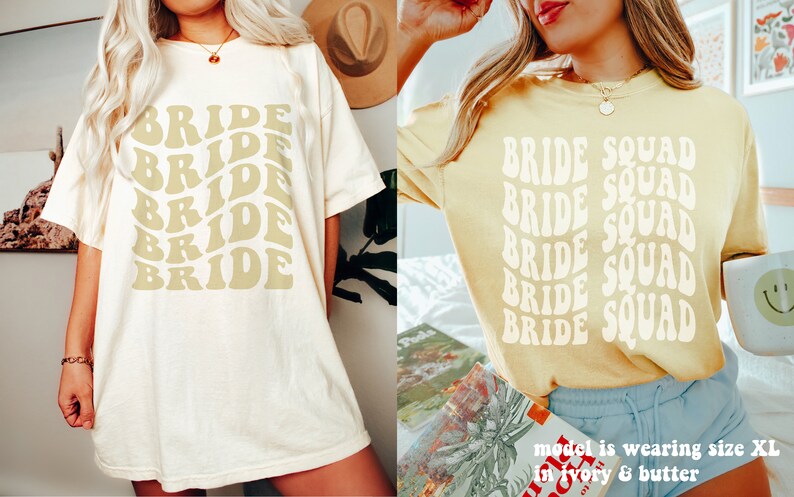May include: Two short-sleeved t-shirts in ivory and butter yellow. The ivory shirt features the word BRIDE repeated five times in a wavy, stacked font. The butter yellow shirt features the words BRIDE SQUAD in a wavy, stacked font.