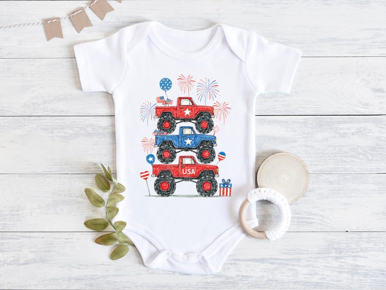 May include: White baby onesie with a patriotic design featuring three monster trucks stacked on top of each other. The trucks are red, blue, and red, with USA text and fireworks. The design includes balloons and a gift box.