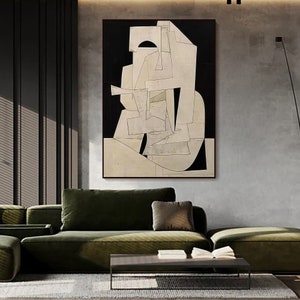 May include: Abstract art print featuring a white geometric design on a black background. The design is made up of overlapping shapes and lines, creating a sense of depth and movement.