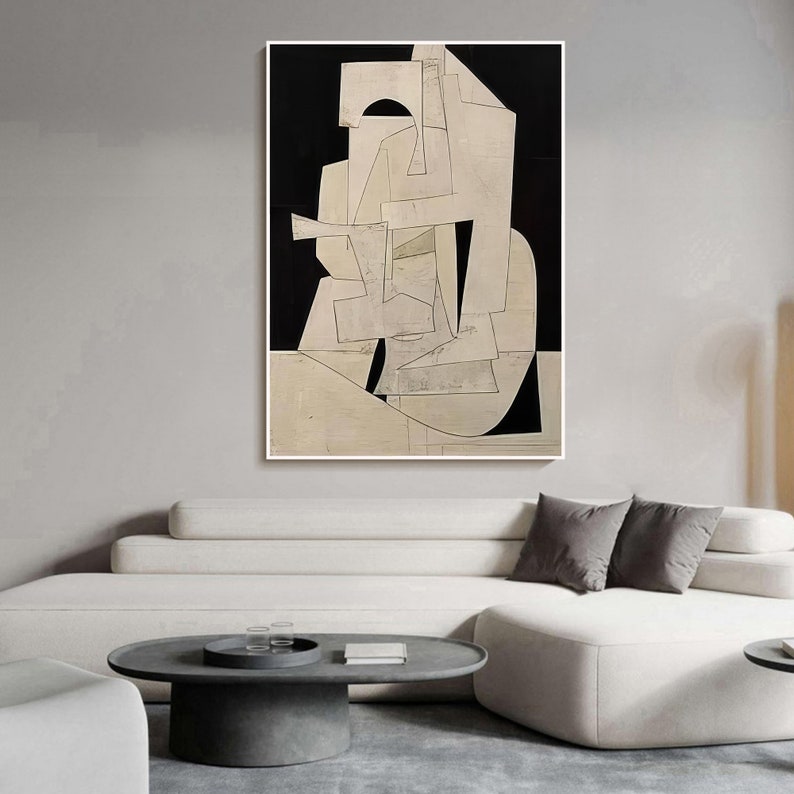 May include: Abstract art print featuring a white and gray geometric design on a black background. The design is made up of overlapping shapes and lines, creating a sense of depth and movement.