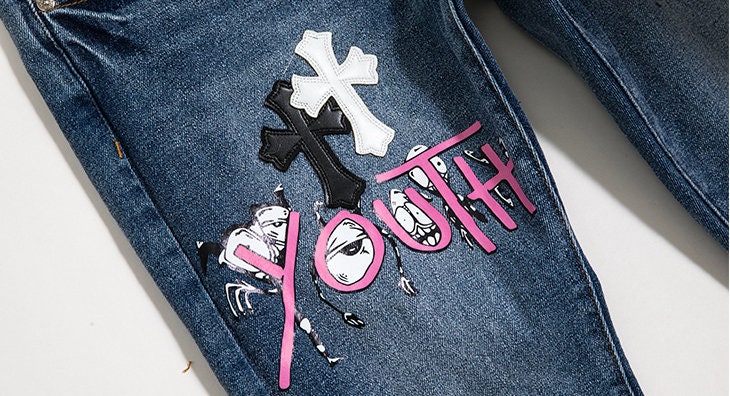 jeans with crosses on them