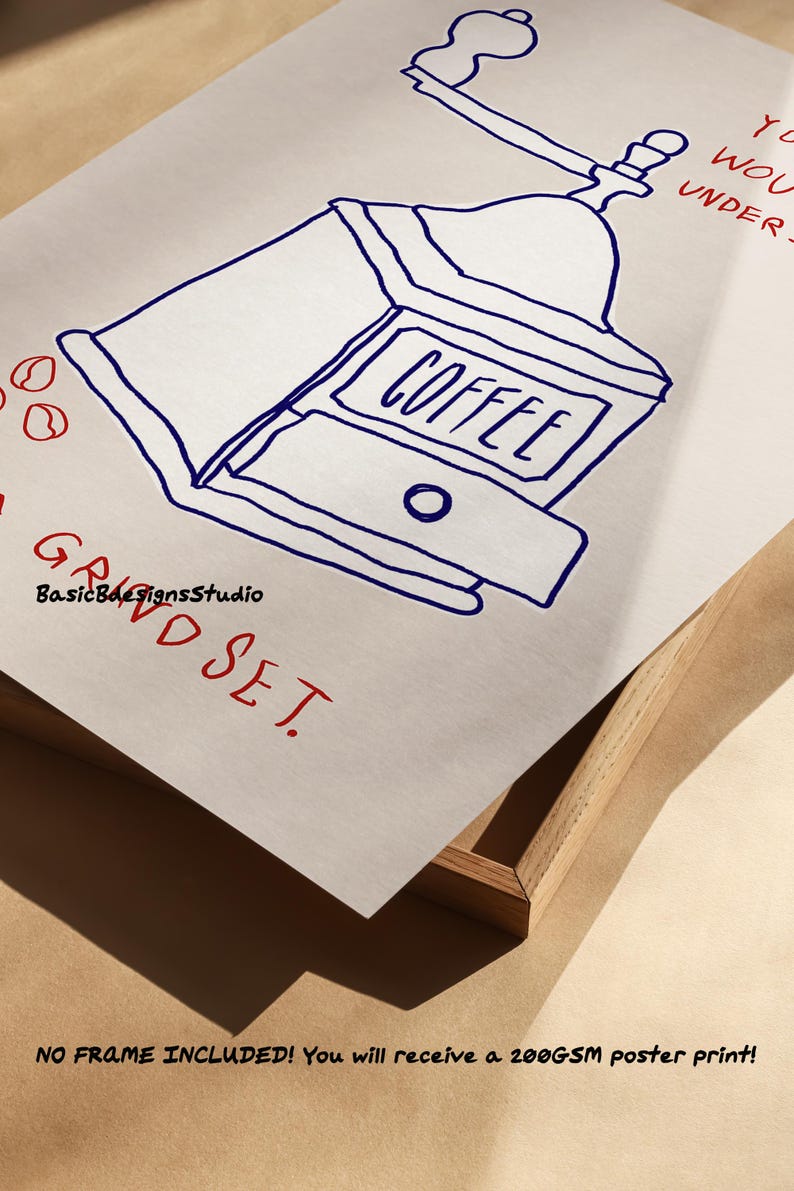 May include: A hand-drawn illustration of a coffee grinder with the word "COFFEE" written on it. The illustration is in blue ink on a white background. The text "GROUND SET" is written in red ink below the illustration.