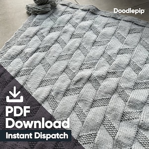 Puede incluir: Una manta de punto gris con un patrón geométrico. La manta está hecha con un hilo texturizado y tiene un brillo sutil. El texto "PDF Download Instant Dispatch" es visible en la esquina inferior izquierda de la imagen.