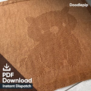 May include: A brown knitted blanket with a bear design. The blanket has a textured appearance and a border. The words "PDF Download Instant Dispatch" are visible in the lower left corner, and "Doodlepip" is in the upper right corner.