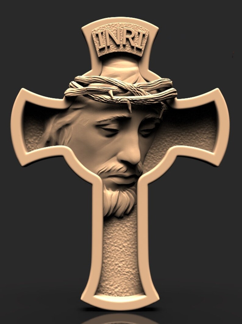 May include: A 3D-printed, beige-colored cross with a detailed carving of Jesus' face. The cross has a raised inscription "INRI" at the top.