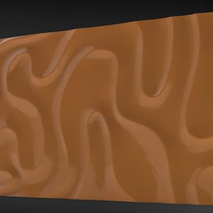 May include: A brown wall panel with a wavy, abstract design. The panel has a smooth, glossy finish.