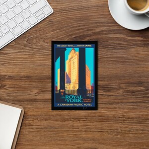 May include: Vintage travel poster advertising the Royal York Hotel in Toronto, Canada. The poster features a blue background with a large image of the hotel, which is described as "The Largest Hotel in the British Empire". The poster also includes the text "A Canadian Pacific Hotel".