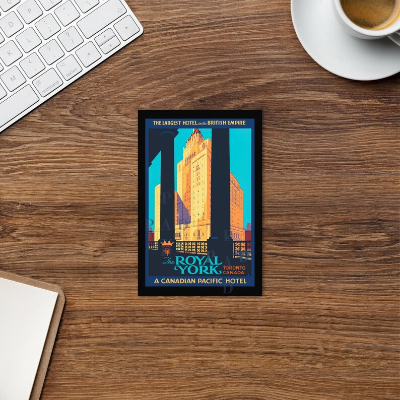 May include: Vintage travel poster advertising the Royal York Hotel in Toronto, Canada. The poster features a blue background with a large image of the hotel, which is described as "The Largest Hotel in the British Empire". The poster also includes the text "A Canadian Pacific Hotel".