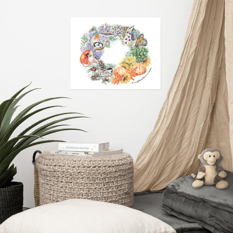 May include: A watercolour illustration of a wreath made of various autumnal elements, including leaves, pumpkins, acorns, birds, and butterflies. The wreath is surrounded by a white background and the text "Everything there is a reason" is written at the bottom.