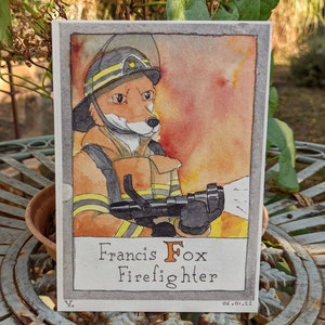 Y’s Animal Alphabet: Francis Fox, pompier - la carte postale