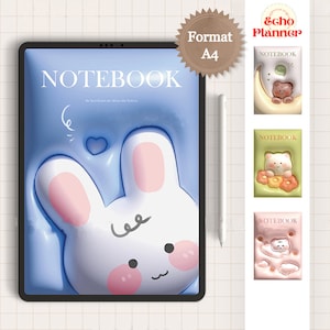 May include: A blue and white notebook with a cute bunny illustration on the cover. The text "NOTEBOOK" is printed in white on the cover. The notebook is on a white grid background.