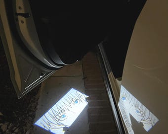 Proiettore luminoso per portiera auto Anime: un po' sfigato ma lo adoro