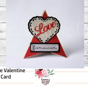 May include: Red and white teepee card with a heart cutout that says "Love forever".