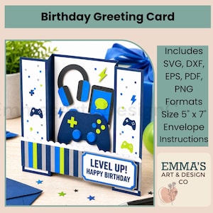 Könnte beinhalten: Eine dreifach gefaltete Geburtstagskarte mit Gaming-Motiv, bestehend aus einem dunkelblauen Controller, schwarz-blauen Kopfhörern und einem Smartphone. Die Karte zeigt den Text LEVEL UP! HAPPY BIRTHDAY und enthält SVG-, DXF-, EPS-, PDF- und PNG-Formate.