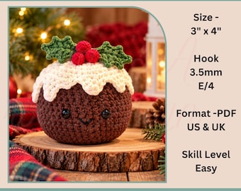 May include: A crochet Christmas pudding pattern by Emma's Art & Design Co. The finished item is brown with white icing, green holly leaves, and red berries. Text includes Size 3 inches by 4 inches, Hook 3.5mm E/4, Format PDF US & UK, and Skill Level Easy.