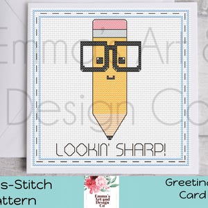 May include: Cross-stitch pattern greeting card featuring a yellow pencil character wearing glasses. The pencil has a pink eraser and the text "LOOKIN' SHARP!". The card is on a white envelope.