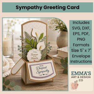 May include: A 5 inch by 7 inch sympathy greeting card featuring a three-dimensional box design with white calla lilies, green foliage, and a scalloped tag reading Forever in our Hearts. The front panel displays the text With Deepest Sympathy.