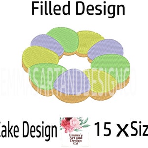 Könnte beinhalten: Ein gefülltes Stickmuster eines King Cakes, einem traditionellen Gebäck aus New Orleans, mit lila, grünem und goldenem Zuckerguss. Das Design ist in 15 Größen erhältlich.