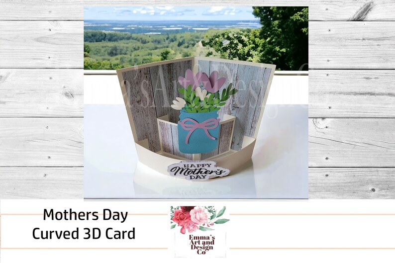 May include: A 3D pop-up card with a rustic woodgrain background. The card features a blue mason jar with pink and white flowers and a "Happy Mother's Day" message.