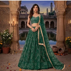 green net dress for women Emerald Green Net Embellished Gown Design by Jigar Mali at Pernia's Pop Up Shop 2026